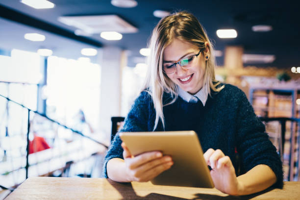 istock Portrait of young attractive woman using tablet 1035468144