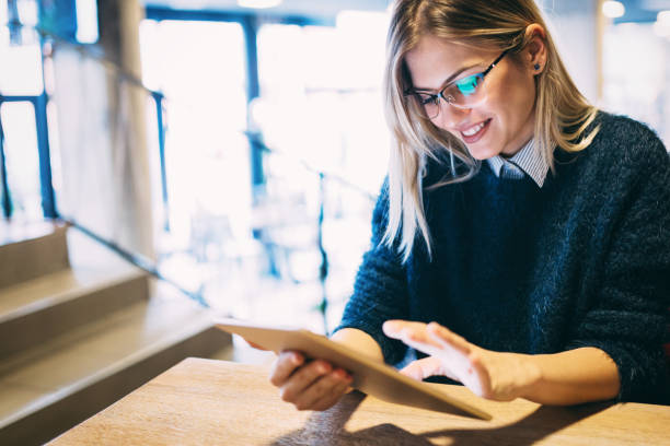 istock Portrait of young attractive woman using tablet 1035468156