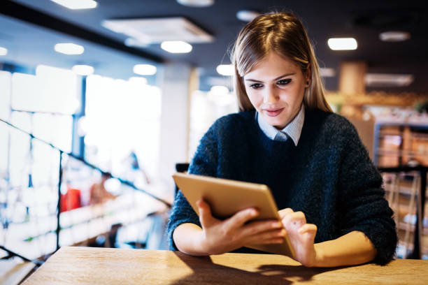 istock Portrait of young attractive woman using tablet 1035468166