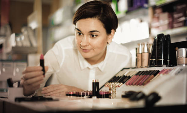 istock Female customer searching for reliable make-up products 1035483506