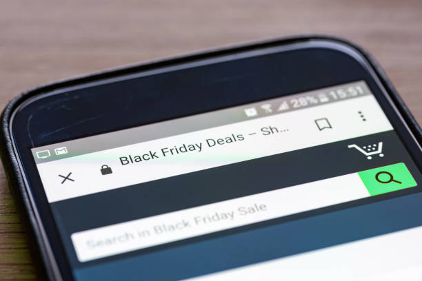 istock Black Friday Deals 2018 text on shopping app on smartphone screen closeup 1035486940