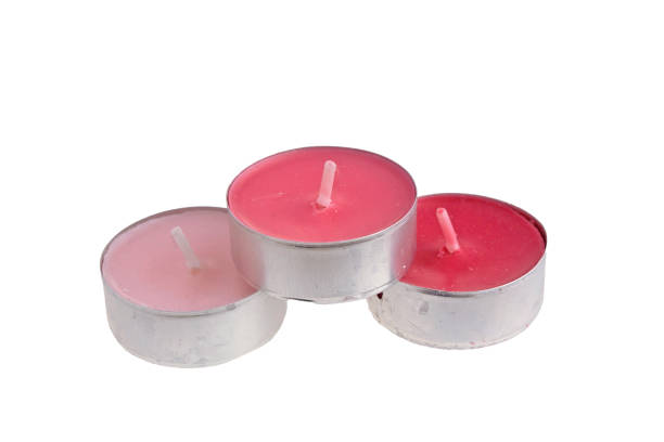 изолированные свечи на белом фоне - tea light candle white single object стоковые фото и изображения