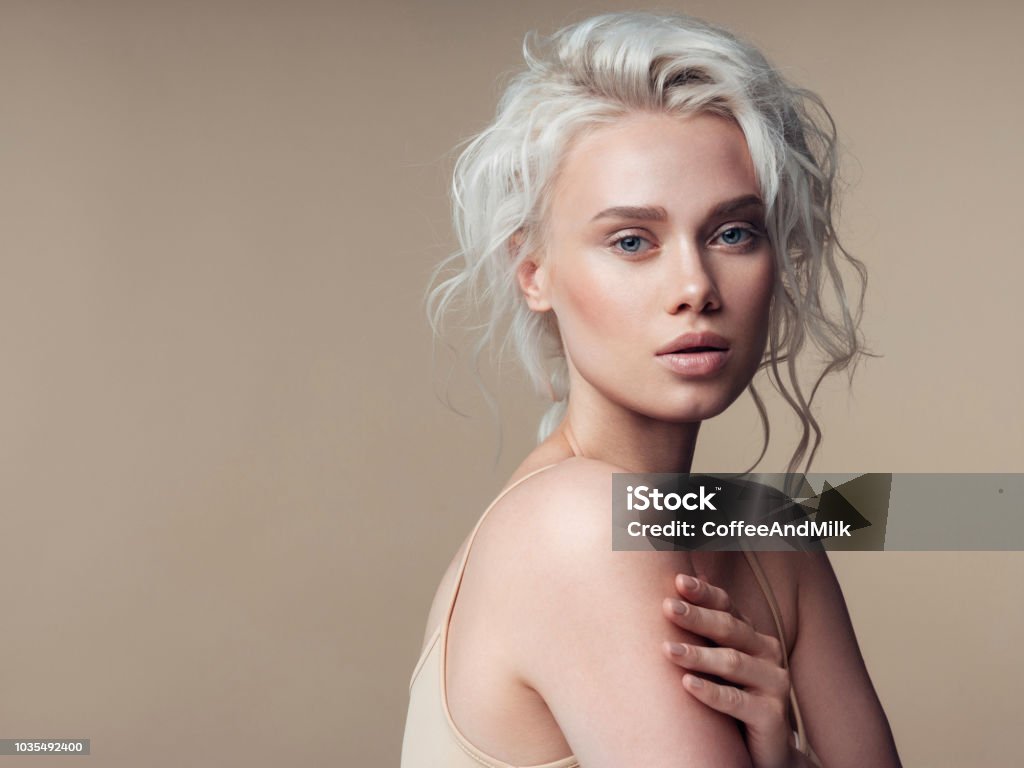 Beautiful woman with make-up and stylish hairstyle Women Stock Photo