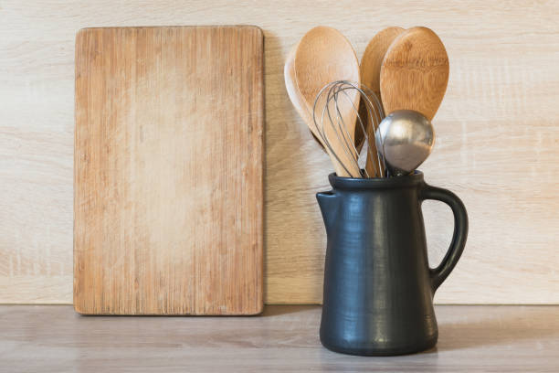 istock Crockery, clayware, dark utensils and other different stuff on wooden tabletop. Kitchen still life as background for design. Copy space. 1035497078