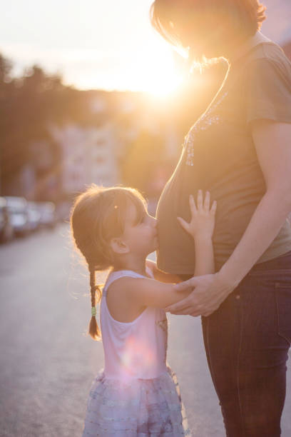 istock Kiss For Her Little Brother 1035500082