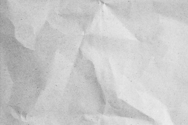 istock crumpled white color paper horizontal background texture for design concept 1035500810