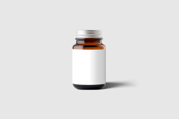 amber supplement bottle & box mockup su sfondo grigio chiaro. - drug bottle foto e immagini stock