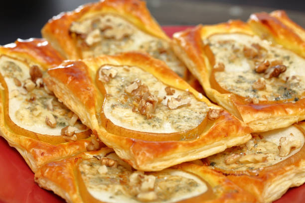 istock Puff pastry with baked pears, blue cheese and walnuts 1035505662