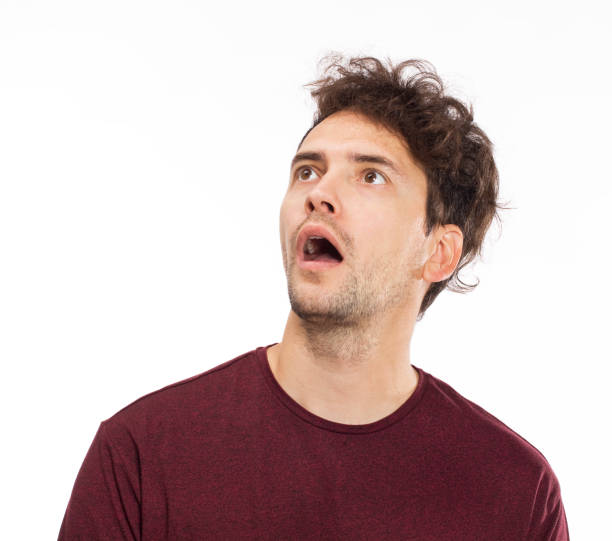 istock Surprised young handsome man with t-shirt 1035512646