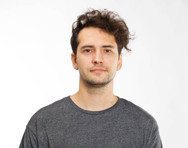 istock Cheerful smiling young man portrait 1035512886