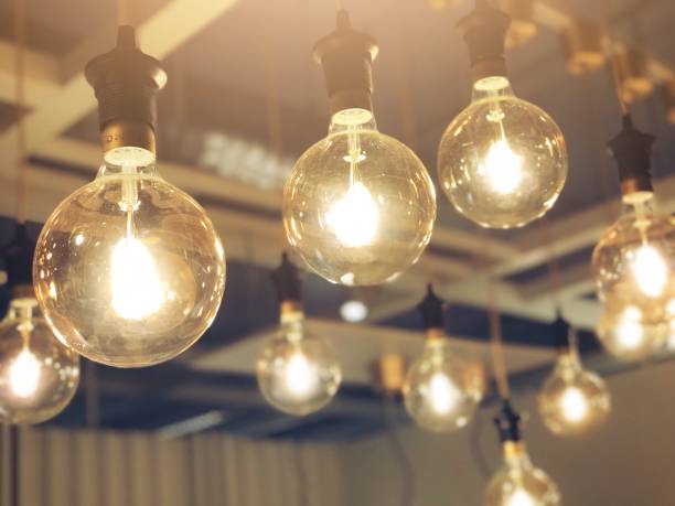 istock Light bulbs decoration in cafe shop, new ideas concept, thinking innovation, business solutions 1035513066