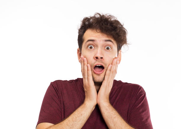 istock Surprised young handsome man with t-shirt 1035513132