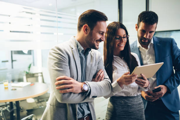 istock Picture of businesspeople using digital tablet in office 1035517874