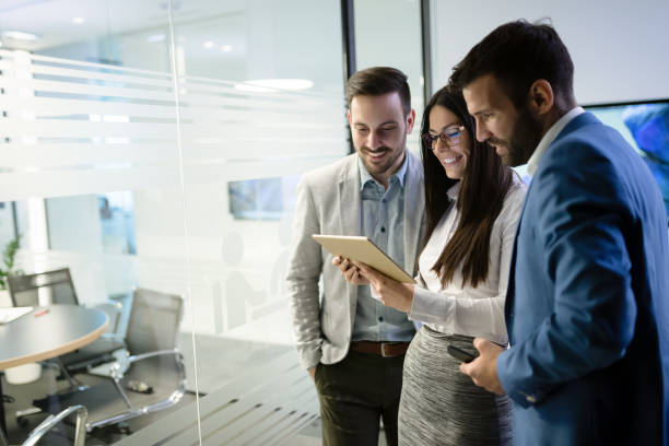 istock Picture of businesspeople using digital tablet in office 1035517880