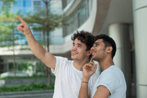 istock Cheerful excited guys dreaming together and looking up 1035518052