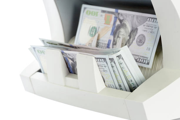 istock money counter isolated on white 1035522126