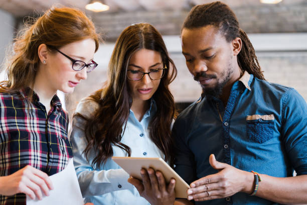 istock Portrait of young architects discussing in office 1035534404