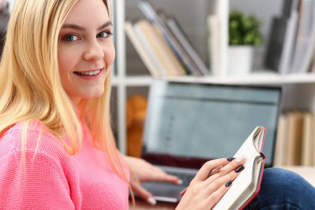 istock young beautiful woman read book study hard prepare for exam 1035534586