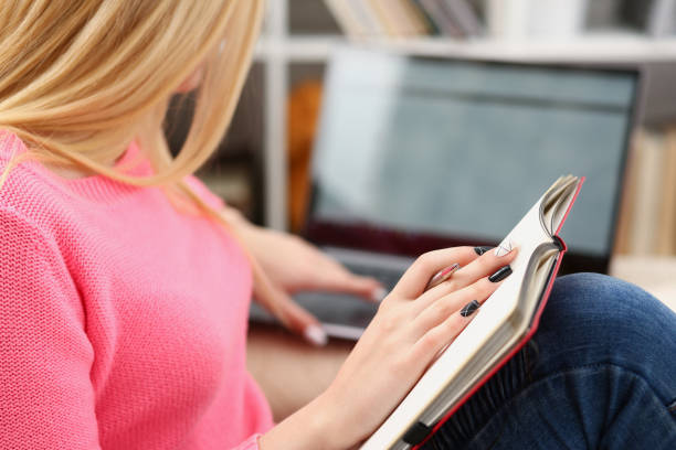 istock young beautiful woman read book study hard prepare for exam 1035534600