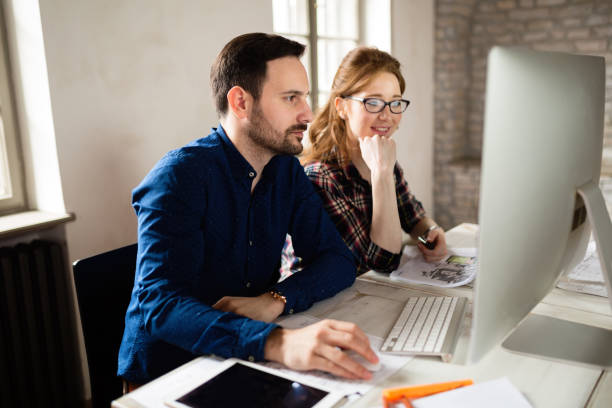 istock Picture of architects working together in office 1035535204
