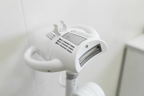istock teeth whitening machine in white dentist's office 1035536082