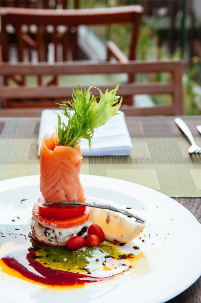 istock Smoked salmon salad with balsamic and pesto salad dressing 1035538994