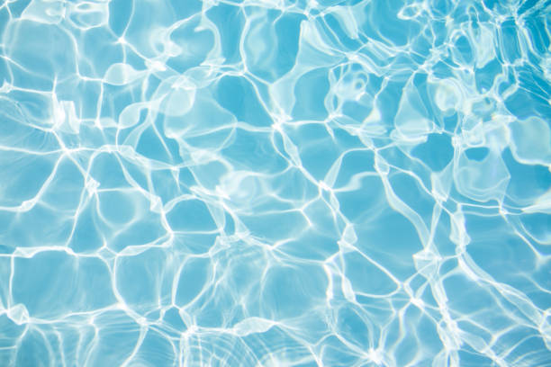 istock Hotel swimming pool with sunny reflections 1035540934