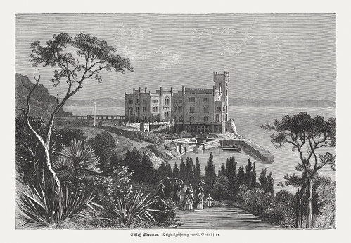 Miramare Castle near Trieste, Italy. Built from 1856 to 1860 for Austrian Archduke Ferdinand Maximilian and his wife, Charlotte of Belgium, later Emperor Maximilian I and Empress Carlota of Mexico, based on a design by Carl Junker (Austrian architect, 1827 - 1882. Wood engraving after a drawing by Pierre Eugène Grandsire (French painter, 1825 - 1905), published in 1876.