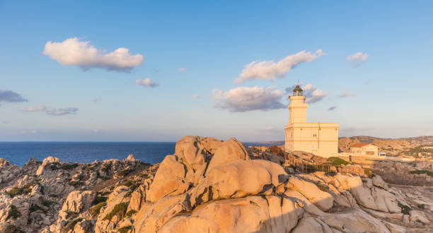 istock Lighthouse on granite rock formations at Capo Testa, Sardinia, Italy. 1035545428