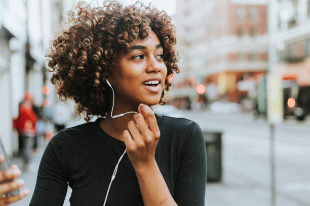 Cheerful woman talking through a headset