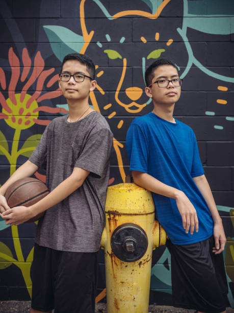istock Twins at basketball 1035552066