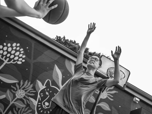 istock Twins at basketball 1035554276