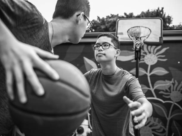 istock Twins at basketball 1035554602
