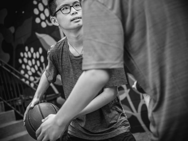 istock Twins at basketball 1035554676