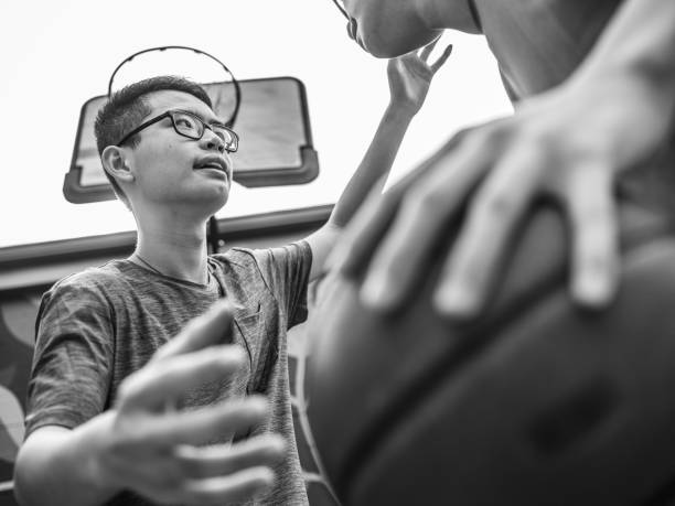 istock Twins at basketball 1035554950