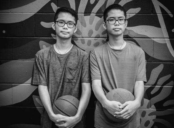 istock Twins at basketball 1035555162
