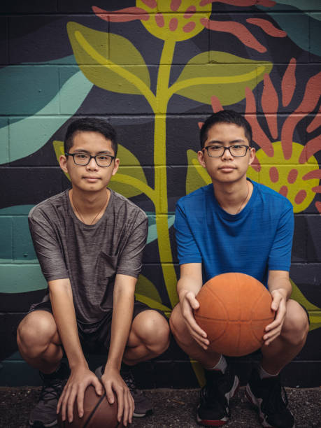 istock Twins at basketball 1035555498
