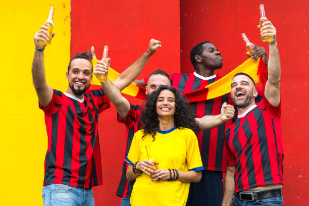 istock Cheerful fans supporting their favorites 1035560772
