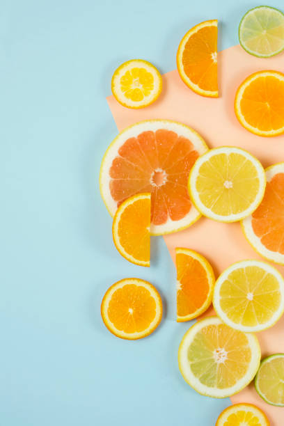 istock Citrus Fruits on Pastel Background 1035560804