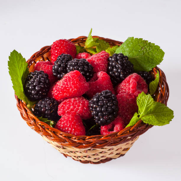 Blackberries and raspberries stock photo
