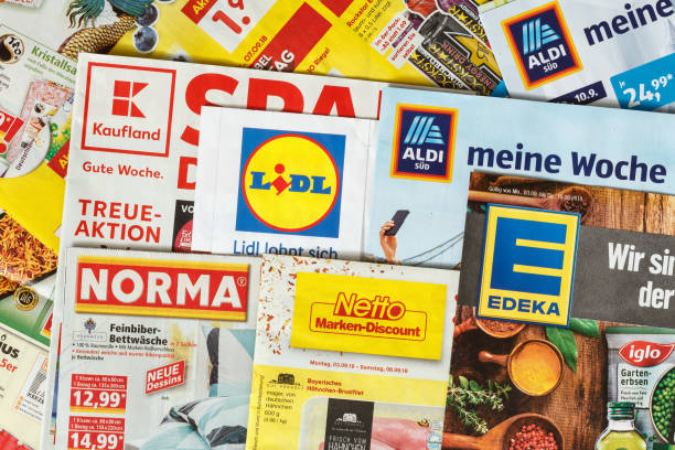 Amberg, Germany - September 3, 2018: Advertising leaflets of some German supermarket chains. Logos and brands are visible. Lidl, Aldi Süd, Norma, Netto,Kaufland,EDEKA