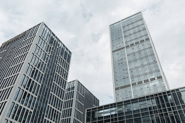 istock Looking up at skyscrapers and sky 1035574490