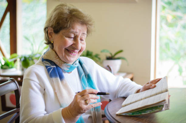 istock Mature woman reading and studying 1035587786