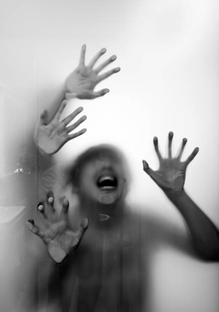 istock Two people behind frosted glass 1035588210