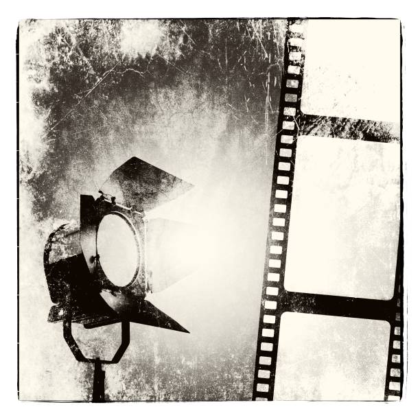 istock Grunge black and white film strip frame with reflector. 1035591138