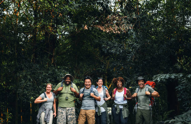 istock Group of happy diverse campers 1035591234