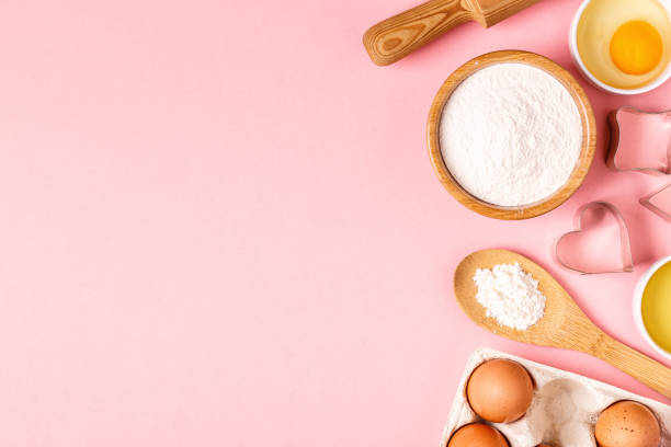istock Ingredients and utensils for baking on a pastel background 1035592652