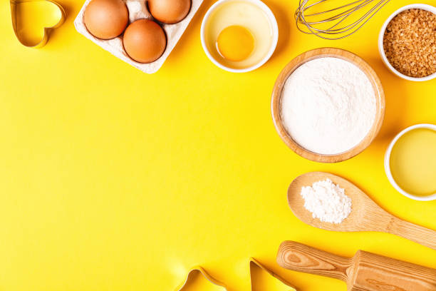 istock Ingredients and utensils for baking on a pastel background 1035592710