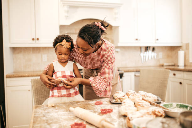 istock Mom and toddler baking together 1035595822