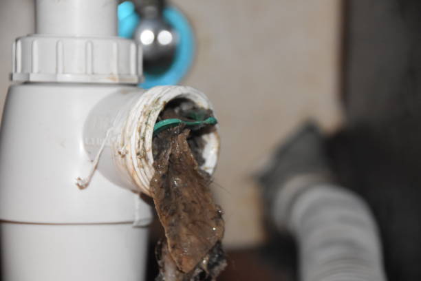 istock Removal of dirt from the sewage pipe 1035596304
